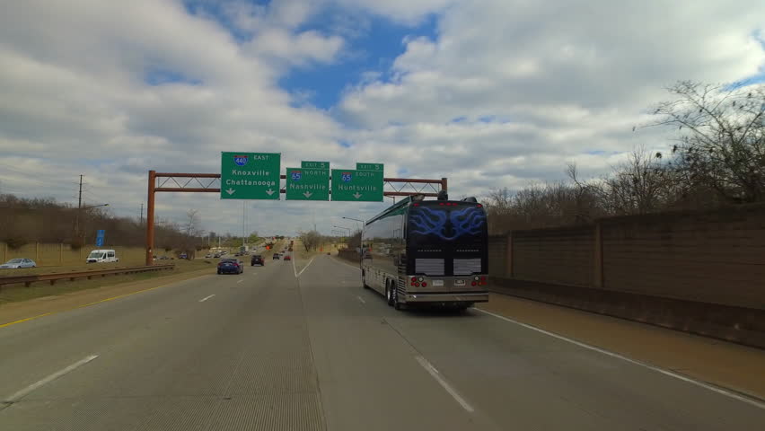 Pov Shot Of Recreational Bus And Cars Moving On Roads Under Cloudy Sky - Nashville, Tennessee