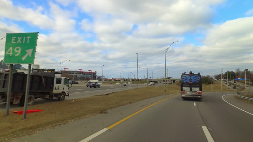 Pov Shot Of Recreational Bus Moving With Cars On Roads Against Cloudy Sky - Nashville, Tennessee