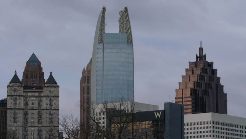 Lockdown Shot Of Tall Modern Buildings Against Sky In Downtown District - Atlanta, Georgia
