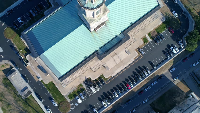 Aerial Top Shot Of Cars Surrounding State Government Office, Drone Flying Forward On Sunny Day - Nashville, Tennessee
