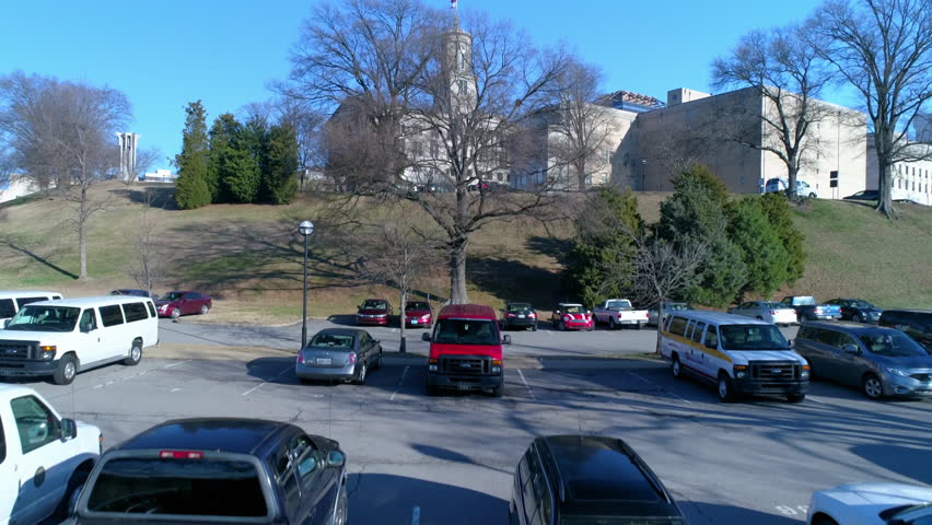 Aerial Forward Ascending Shot Of Tennessee State Capitol In City Against Clear Sky On Sunny Day - Nashville, Tennessee