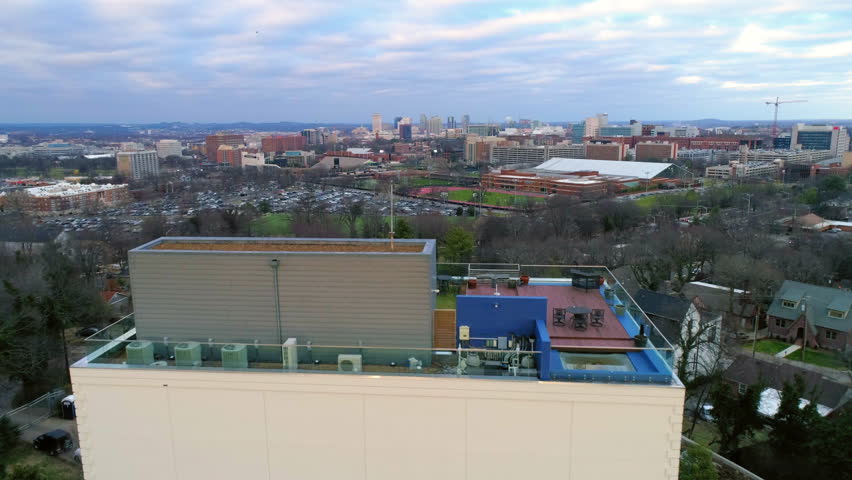 Aerial Forward Terrace Of Building In Residential City Under Cloudy Sky - Nashville, Tennessee