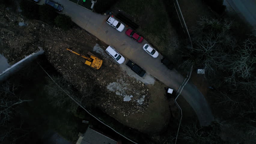 Aerial Top Forward Shot Of Cars Parked On Footpath By Building - Nashville, Tennessee
