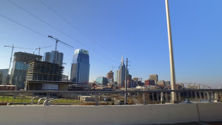 Point Of View John Seigenthaler Pedestrian Bridge In Modern City Against Sky On Sunny Day - Nashville, Tennessee Royalty-Free Stock Footage #1102311253