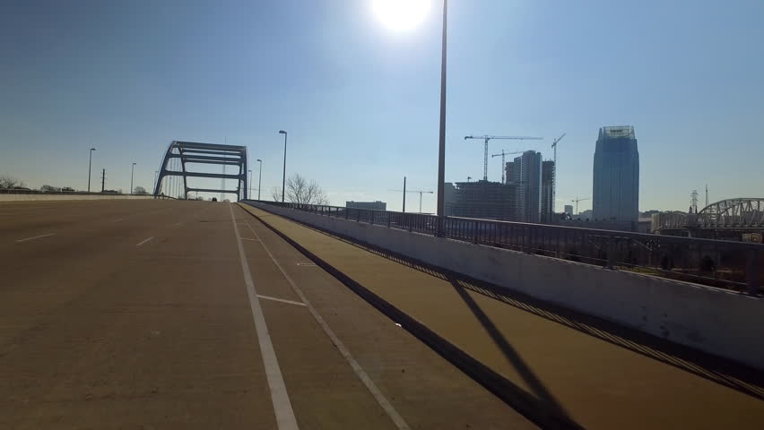Point Of View Downtown And Truss Bridge Seen From Gateway Bridge Road In City On Sunny Day - Nashville, Tennessee