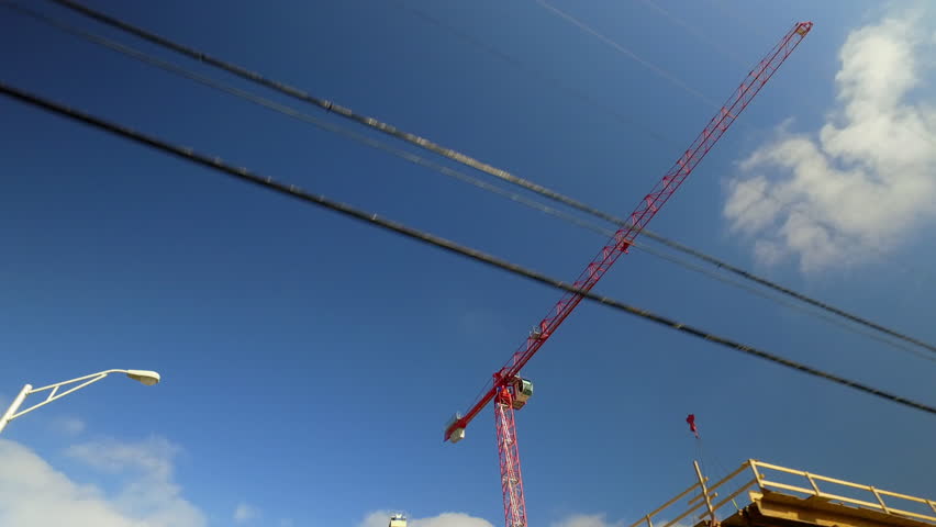 Point Of View Tilt Down Shot Of Crane In Residential City Seen From Car Moving On Road During Sunny Day - Nashville, Tennessee
