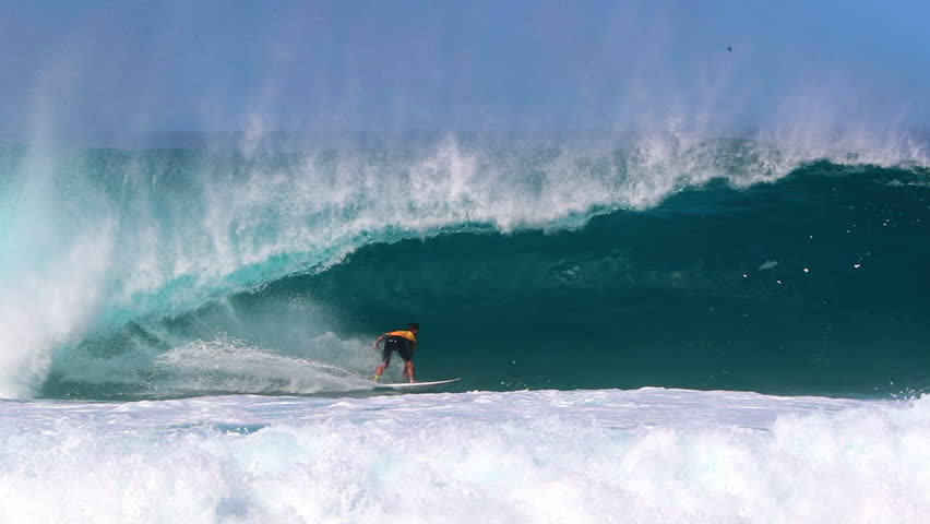 Slow Motion Shot Of Male Tourist Surfing On Ocean Waves During Sunny Day In Summer - Waikiki, Hawaii