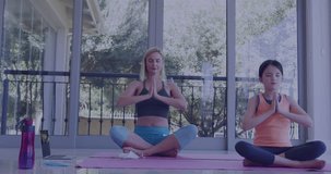 Animation of media icons over caucasian woman with daughter exercising at home. Social media, sport and digital interface concept digitally generated video.