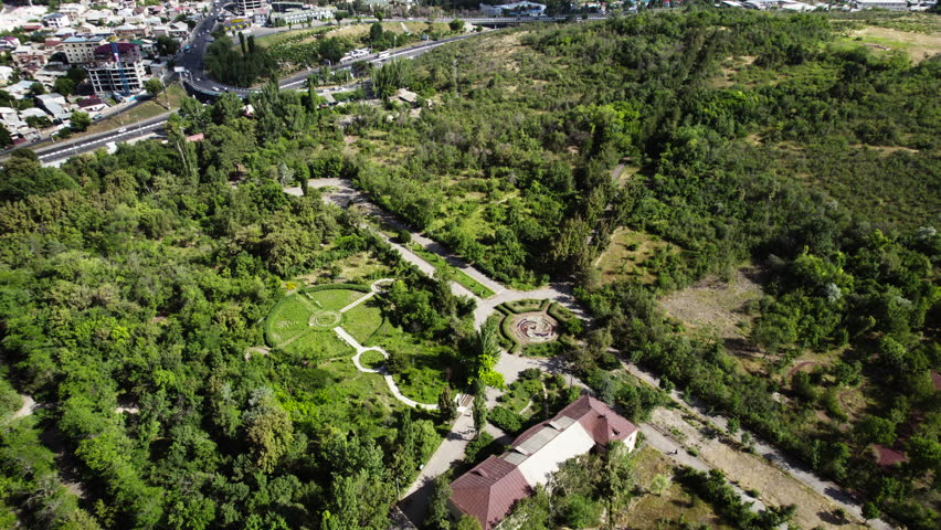 Aerial dynamic shot of Botanical garden in Yerevan, Armenia and Nork-Marash District