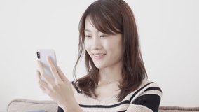 Asian woman using a smartphone
