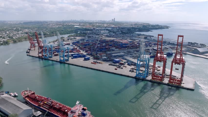 Port cranes and container storage area at Haina Port, Dominican Republic; aerial