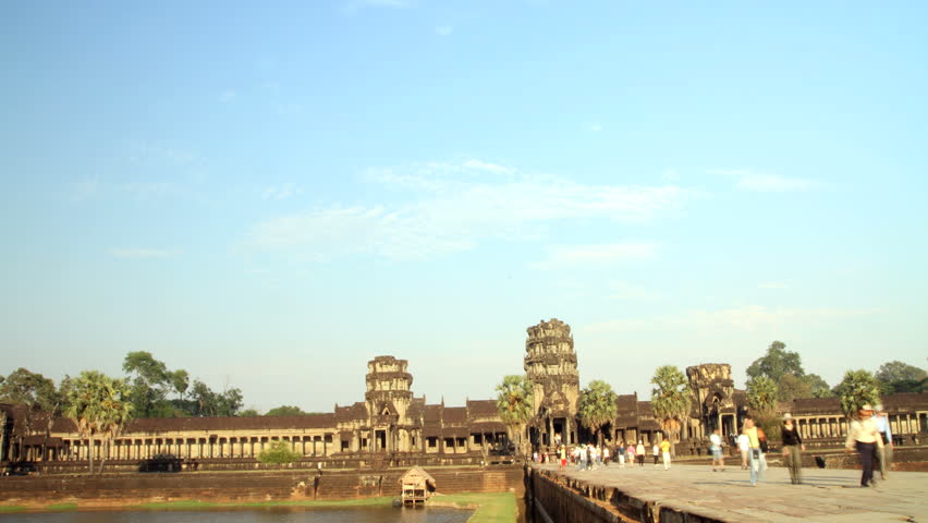 time laps of people walking in and out of Angkor wat 