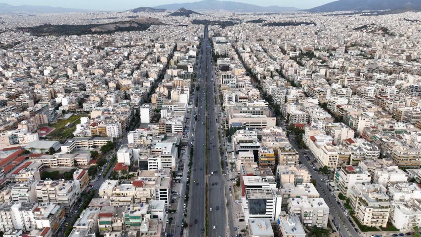 Aerial drone time-lapse video of famous avenue of Syggrou and urban cityscape leading to Athens riviera, Attica, Greece Royalty-Free Stock Footage #1102364113