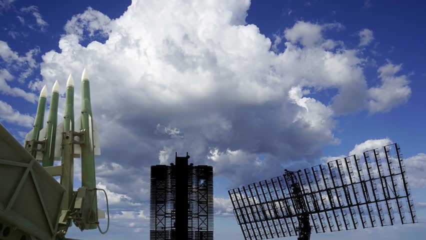 Air defense radars of military mobile anti aircraft systems and Russian anti aircraft missiles OSA-AKM on background clouds (time lapse, with zoom),Russia