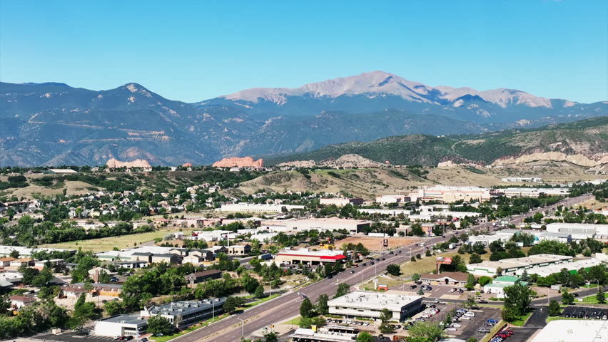 i25 Colorado Spring Garden of Gods Aerial mountain scape summer fly up city cars Colorado