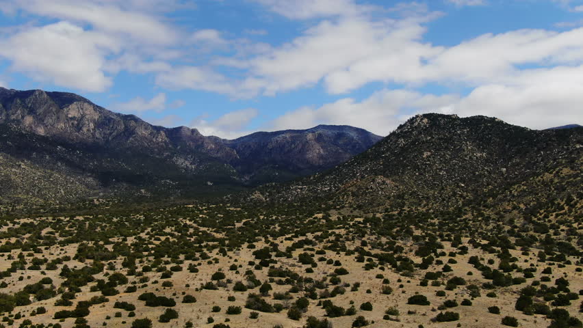 Aerial pan of trails hiking Sandia Mountains Albuquerque New Mexico