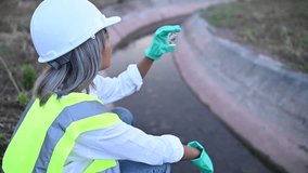 Environmental engineers inspect water quality,Scientist Bring water to the lab for testing,Check the mineral content in water and soil,Consultation to solve the problem of chemical contaminated water  - Powered by Shutterstock - Get 15% off with code: PIKWIZARD15