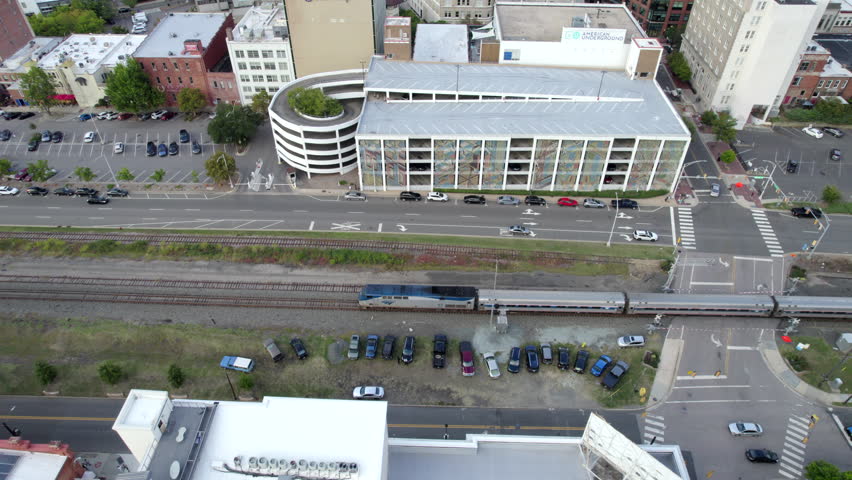 Passenger train arrives at train station in Durham, North Carolina USA