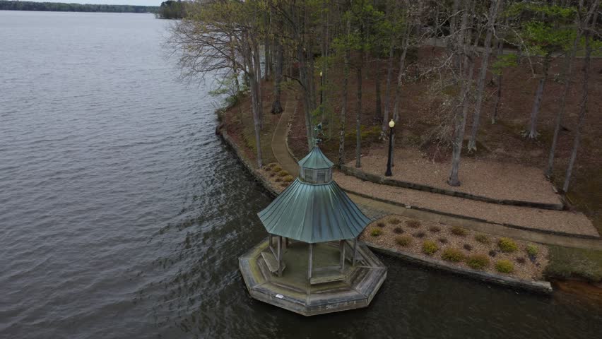 Gazebo on a lake zooming in