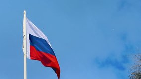 National Flag of Russia. Waving Russian Flag, 4K video. Russian Federation State Flag in the sky of Russia