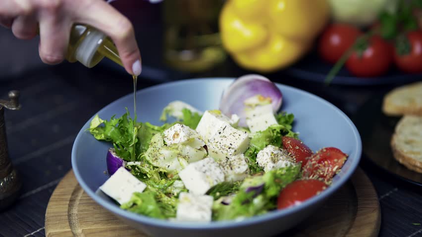 Eat Organic Lettuce Greek Salad. Dieting Healthy Food. Vegan Raw Food On Diet. Vegetarian Weight Losing Salad Balanced Food. Superfood Organic Greek Salad On Dieting. Lettuce Leaves Greek Salad Feta