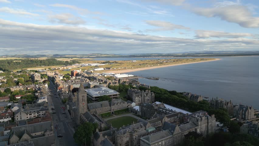 Aerial view of St Andrews in Scotland with a golf course background Royalty-Free Stock Footage #1102415661