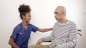 Doctor nurse black woman in blue uniform talks, encourages and checks a cancer patient. World Cancer Day. - Powered by Shutterstock - Get 15% off with code: PIKWIZARD15