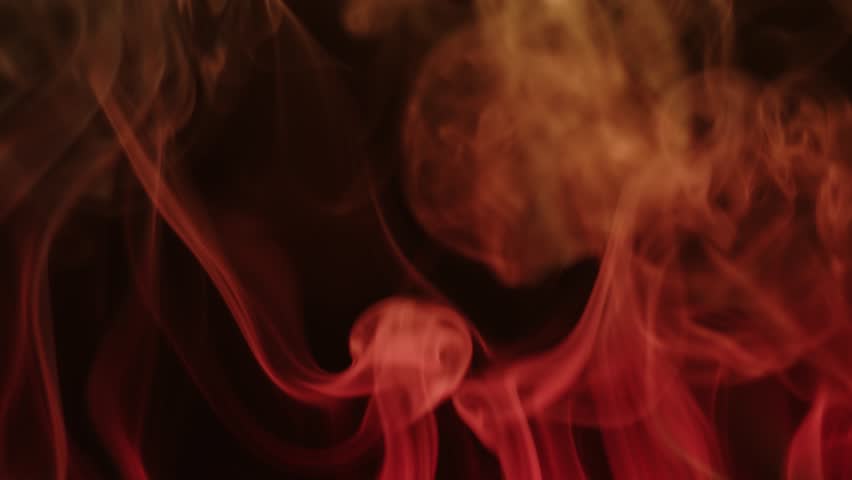 Orange, yellow smoke in the light of different colors on a black background, abstract background, dancing fog. 8K downscale, 4K. Royalty-Free Stock Footage #1102422135