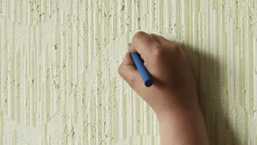 Human hand draw couple of people with dry blue marker on old wallpaper closeup, develop artistic skills. Space for painting, disorderly conduct, drawing, paperhanging damage, illustration. - Powered by Shutterstock - Get 15% off with code: PIKWIZARD15