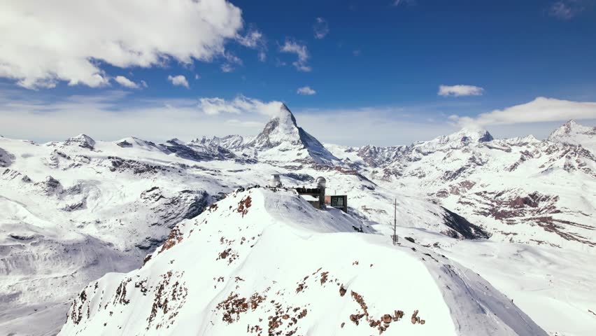 Aerial view of Gornergrat on top of Switzerland mountain ridge with Matterhorn in winter