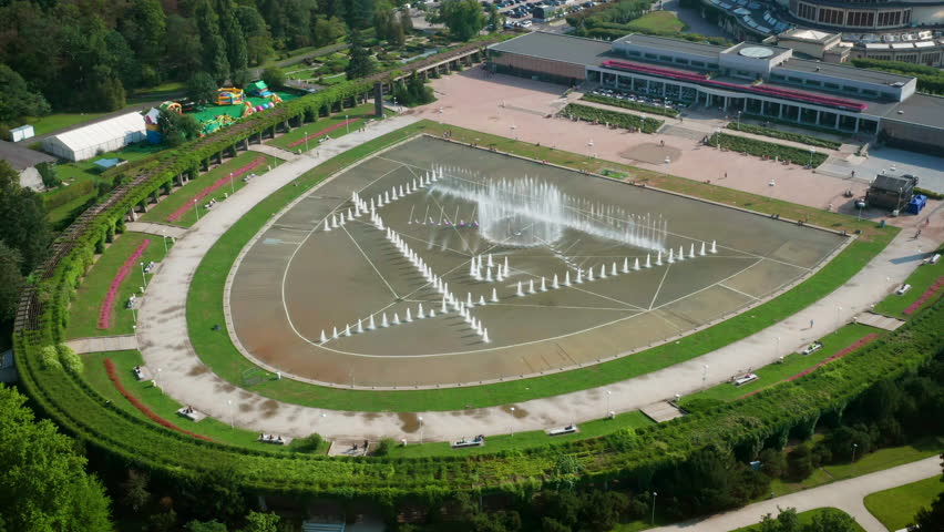 Aerial (drone) view of great fountain in Wroclaw, Poland during show.