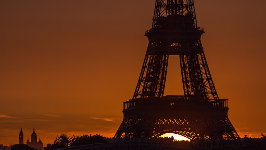 Eiffel Tower sunrise timelapse close up view with orange sky in Paris, France. View from Grenelle bridge early morning Royalty-Free Stock Footage #1102431867