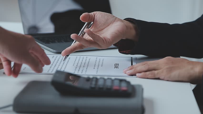 Close up view of job interview in office, focus on resume writing tips, employer reviewing good cv of prepared skilled applicant, recruiter considering application, hr manager making hiring decision