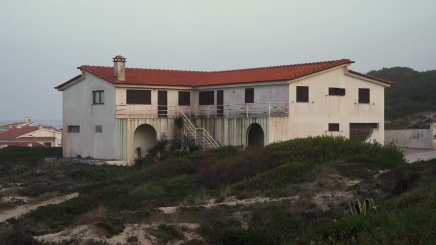 Abandoned House On A Cliff