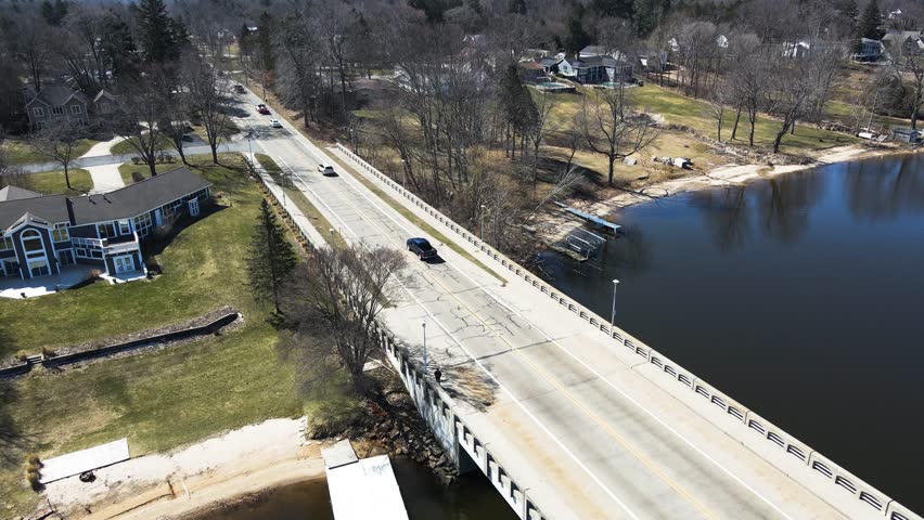 Descending to a local bridge in Muskegon over Mona Lake.