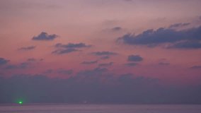 Majestic sunset or sunrise landscape Amazing light of nature above the ocean.
sweet cloudscape sky and clouds moving away rolling. 
4k colorful dark twilight clouds above the ocean. 

