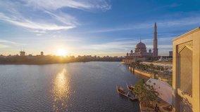 Beautiful golden sunset Time Lapse at Putra mosque by a lake in Putrajaya, Malaysia at dusk. Prores Full HD Timelapse.