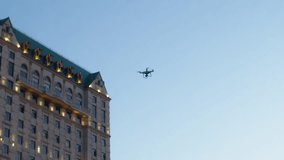 Drone flying over city near building copy space