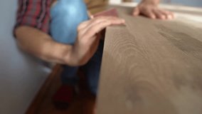 The carpenter works with wood in the workshop. Manufacture of furniture, wood. Private business, work concept. - Powered by Shutterstock - Get 15% off with code: PIKWIZARD15