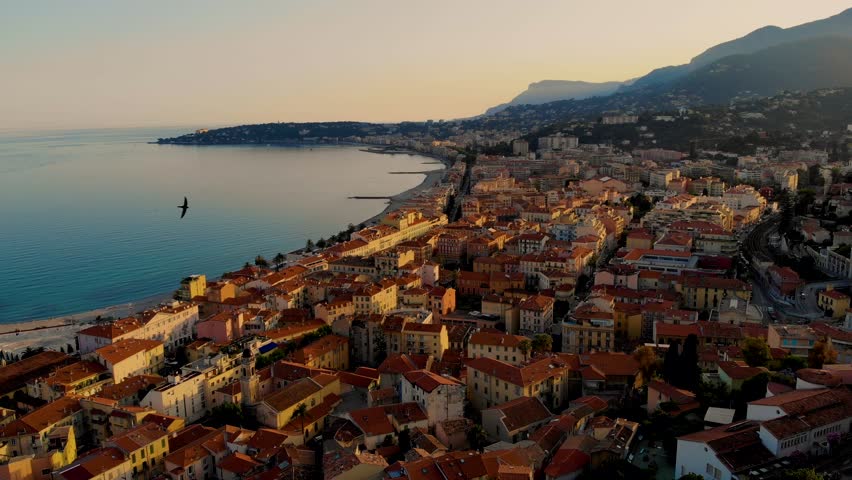 colorful old town Menton on the french Riviera, France. Drone aerial view over Menton France Europe during sunset Royalty-Free Stock Footage #1102451631