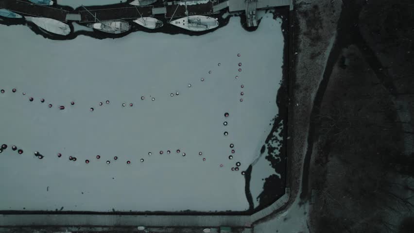 Aerial view of Angsholmen in Hundudden frozen harbor in winter, Djurgårdsbrunn, Stockholm, Sweden.