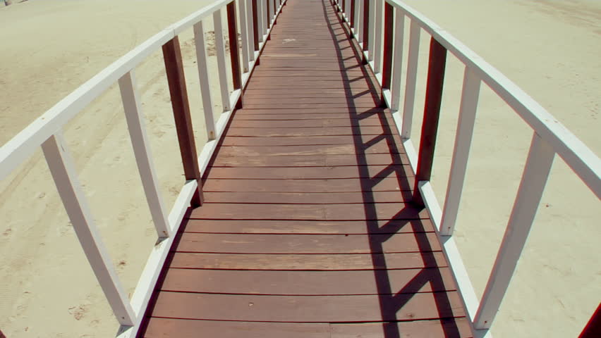 Long pier on a tropical beach
