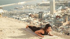 video of woman doing yoga outdoors