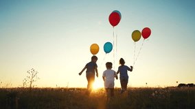happy family. children kid together run in park with balloons silhouette. people in park. children and son run. happy family and little baby child summer. kid dream concept. children run fun - Powered by Shutterstock - Get 15% off with code: PIKWIZARD15
