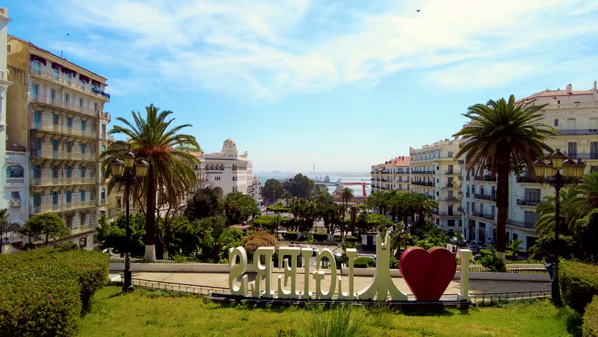 shot of the great post office of algiers with the great mosque in the background