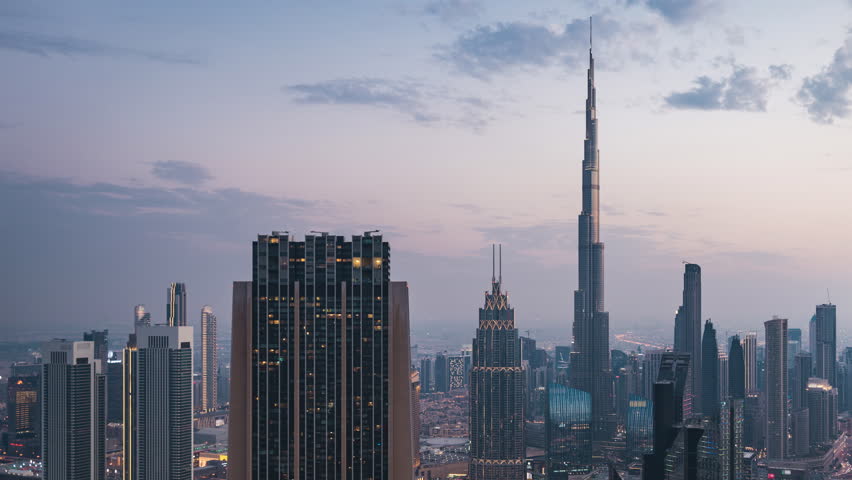 Day to night timelapse view of modern skyscrapers in Downtown Dubai, United Arab Emirates (UAE), business and finance concept. Royalty-Free Stock Footage #1102480909