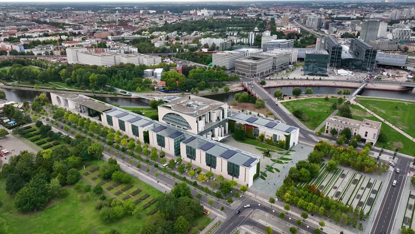 German Chancellery (Bundeskanzleramt)
and Berlin Cityscape at the Background, Germany, Europe. Aerial View 4K Panning Shot, Panorama
