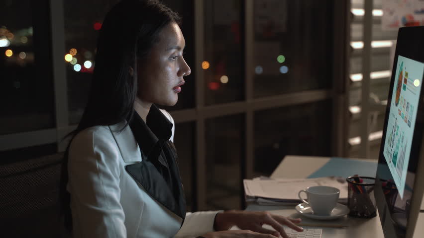 Businesswoman hard working to late night and work overtime at office. Manager assigns task after timeout of work. Concept of business management, assignment job late and working overtime. Royalty-Free Stock Footage #1102495155