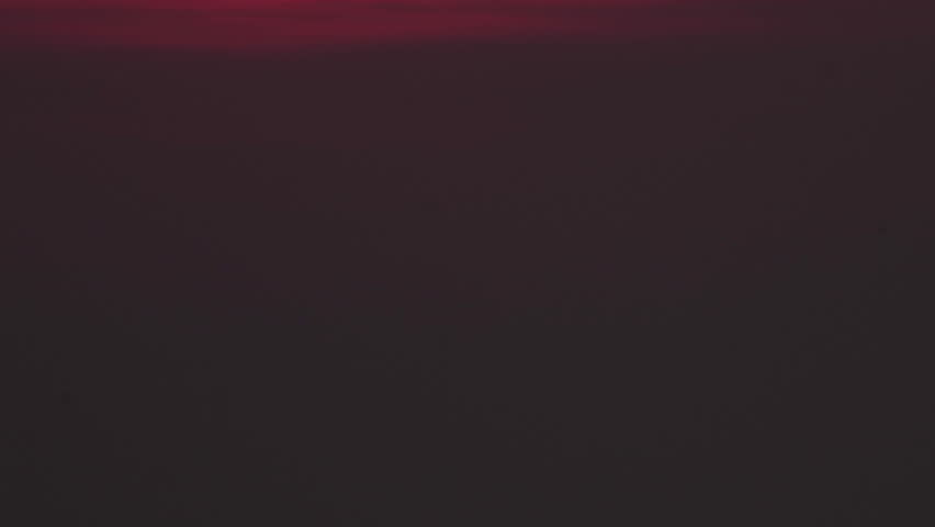 Huge pink sun set down over horizon timelapse. Red star close up. Awe sky sunset view. Scenic solar glow. Beautiful sundown light. Large sun sets sea bay time lapse. Warm sunlight shine marine shore.