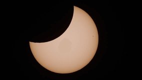A solar eclipse occurs when the Moon passes between Earth and the Sun, thereby obscuring the view of the Sun from a small part of the Earth. - Powered by Shutterstock - Get 15% off with code: PIKWIZARD15